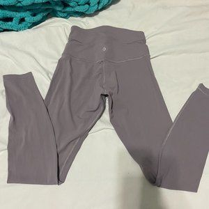 Lululemon Wunder Train leggings 25' in Taupe color with a crossover waistband.